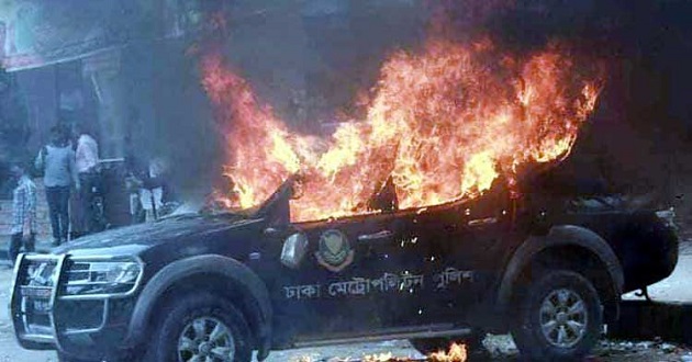 fired police car at bnp office