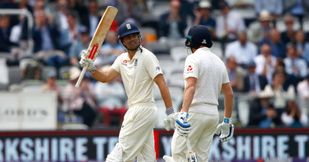 cook raised his bat after notching fifty