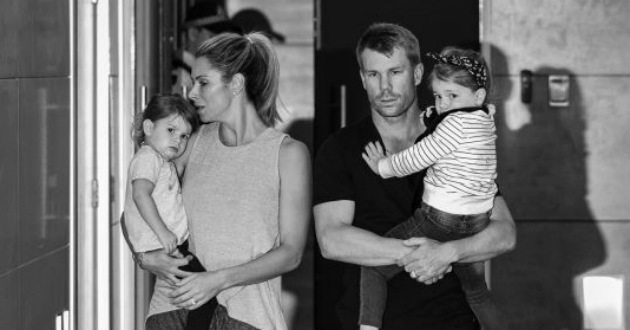david warner with his wife and two daughters