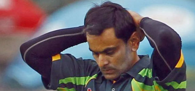 hafeez banned from bowling for one year inner