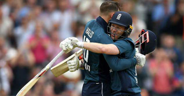 hales celebrates with morgan after reaching his century
