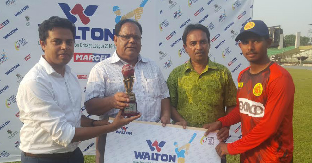 mosaddek taking his mon of the match prize from walton official milton ahmed