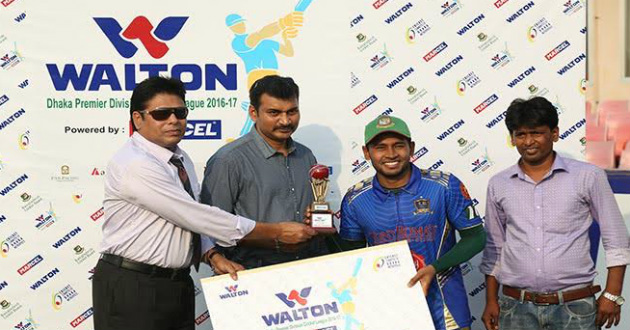 mushfiq taking his man of the match prize after beating brothers in dhaka premeir league