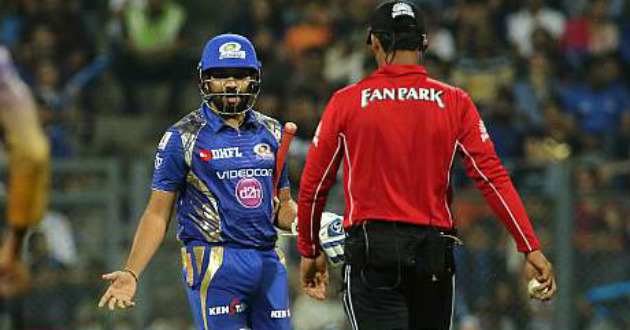 rohit sharma reprimanded for showing dissent to umpire