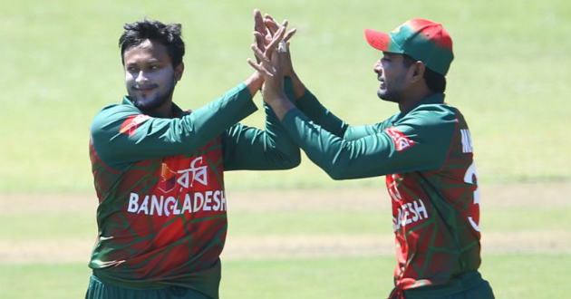 shakib and mahmudullah celebrating a wicket