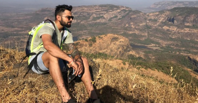virat on mountain after lossing pune test by 333 runs