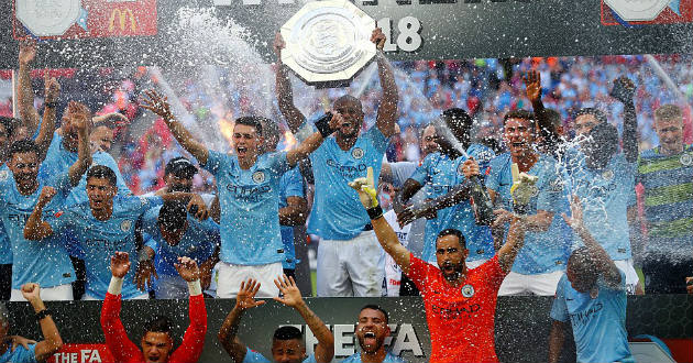 manchester city celebrate their trophy