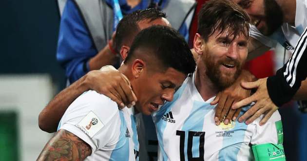marcos rojo and messi celebrating win