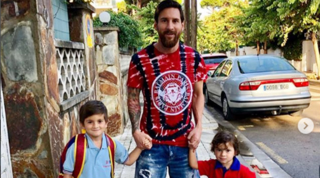 messi with son