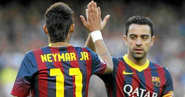 neymar and xavi celebrate a goal for barcelona