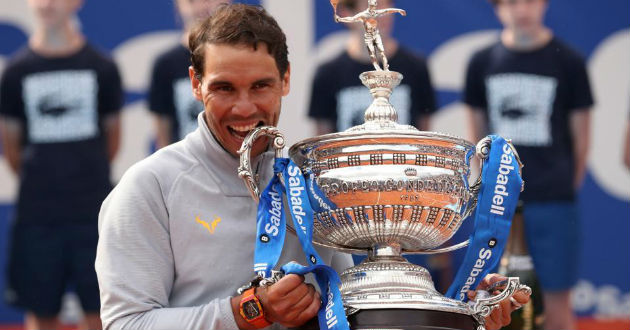 nadal celebrates with trophy