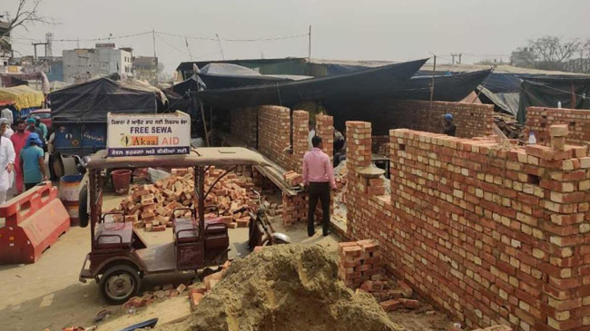 indian farmers are building brick houses 1