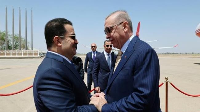 iraqs prime minister mohammed shia al sudani and turkeys president recep tayyip erdogan