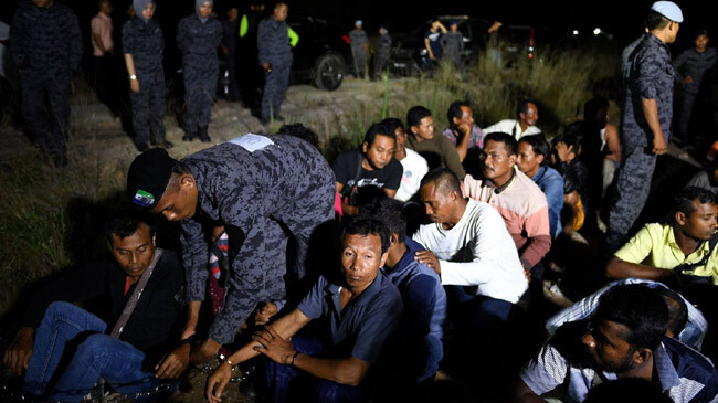 malasia police arrested illegal immigrants