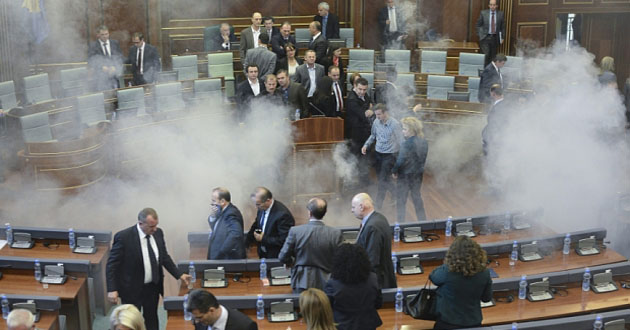 tear gas throw in parliament