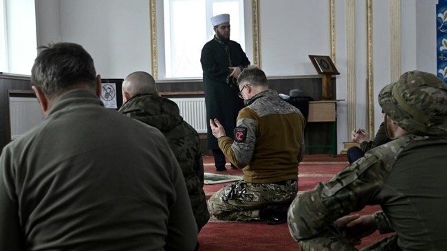 worshippers at prayers in a mosque near ukraines eastern front