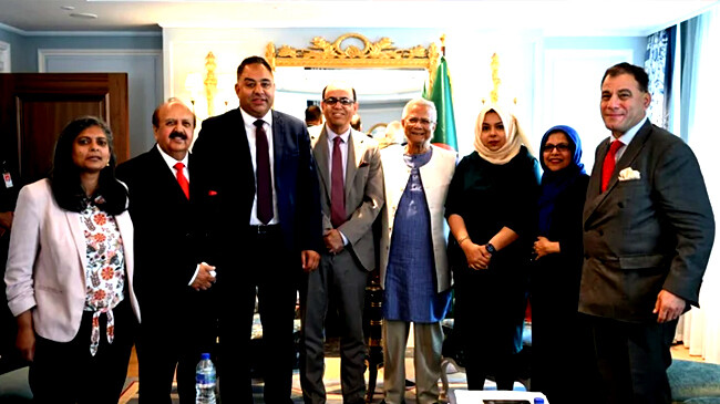 a group of uk parliamentarian and professor muhammad yunus