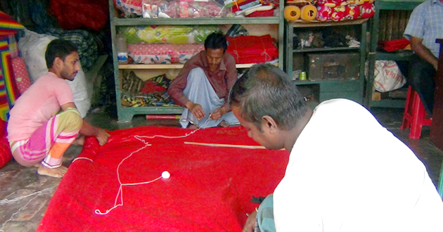 artisans making coated coats