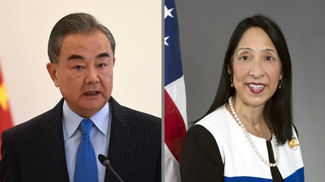 chinas foreign minister wang yi and us assistant secretary of state michele sison