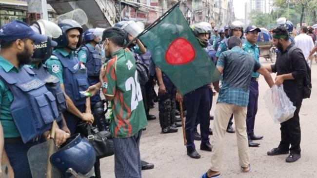 giving police biscuits and water