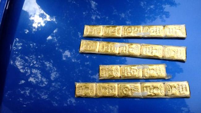 gold bar under shoe
