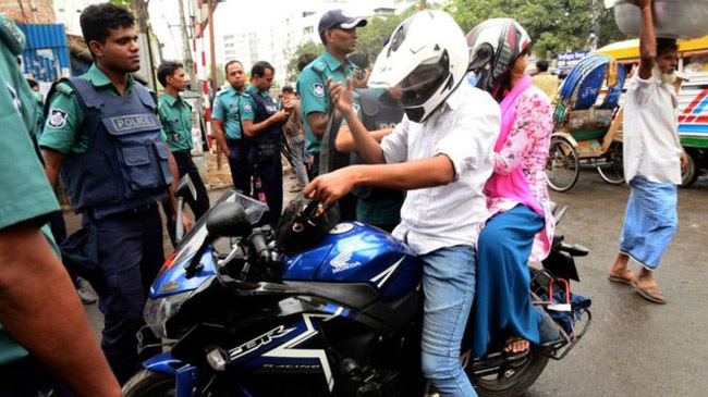 husband and wife on motor cycle