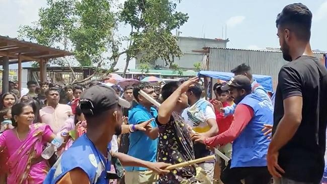 jaflong tourists are beaten with sticks