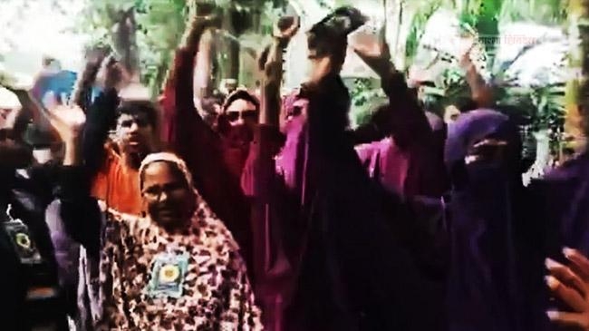 men dances wearing borqa election campign home
