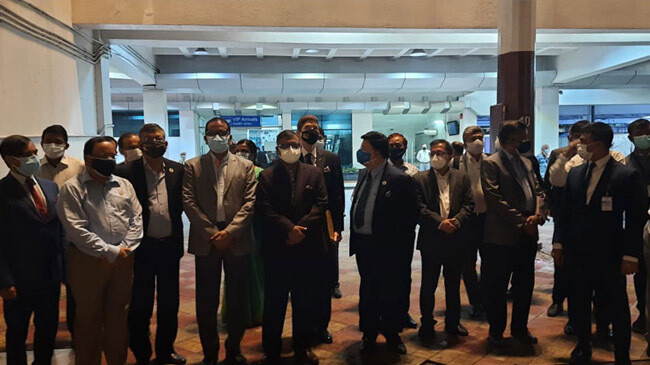 ministers and officials in airport taking tica