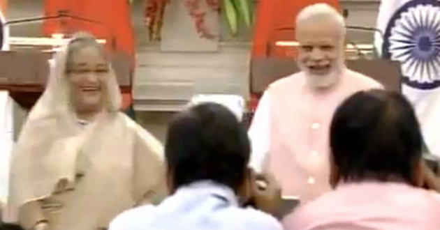 modi and hasina laughing after hearing anchor