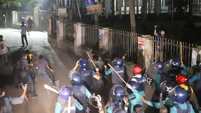 police charge batton protest rally inner