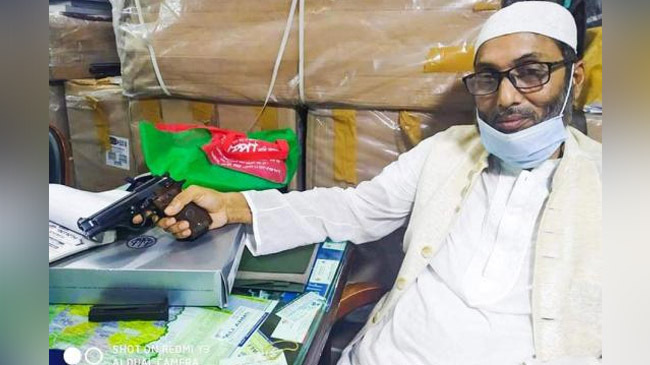 rejaul karim with pistol