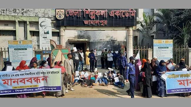students lay on ground