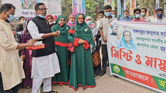sweets and mask distribution quader mirza