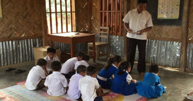 tribal language book in hand