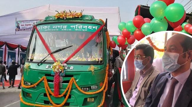 two mayors on green bus