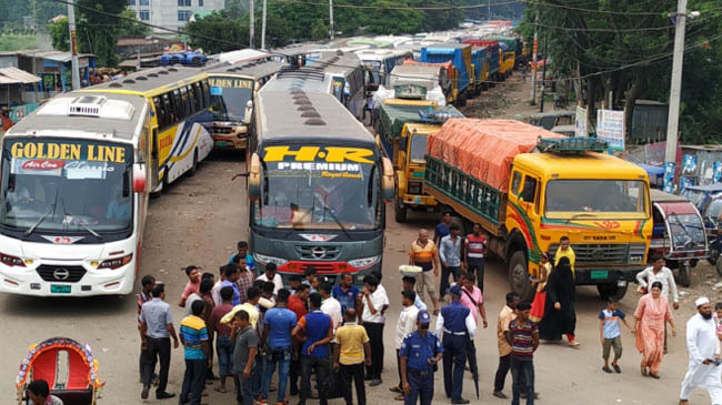 vehicles wait in paturiya