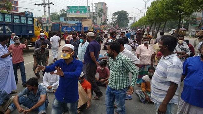 workers protest on highway 2