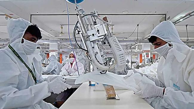 workers working garments