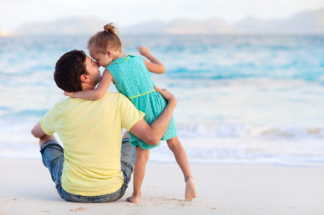 child with her father