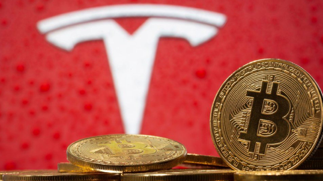 tesla could by bought by bitcoin