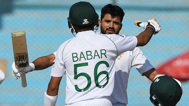 azhar celebrates his ton with babar