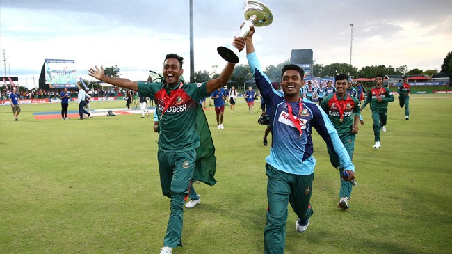bangladesh players celebrate with the trophy