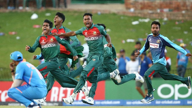 bangladesh players run onto the field after victory