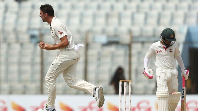 cummins celebrates after dismissing mushfiqur