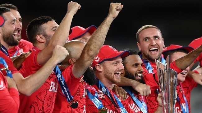 england team celebrating with trophy