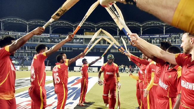 hamilton masakadza walks out to a guard of honour in his final match
