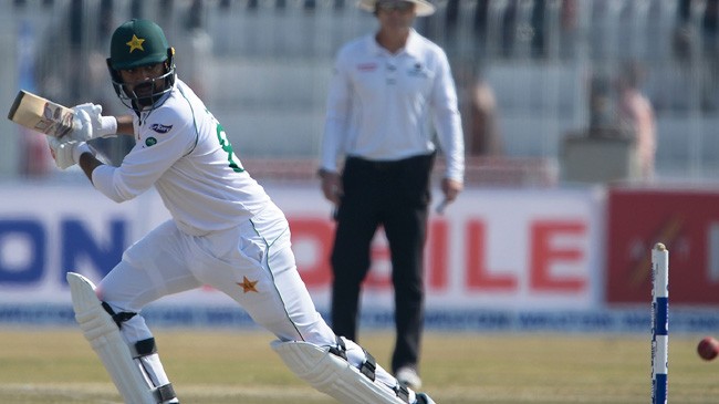 haris sohail guides the ball behind square