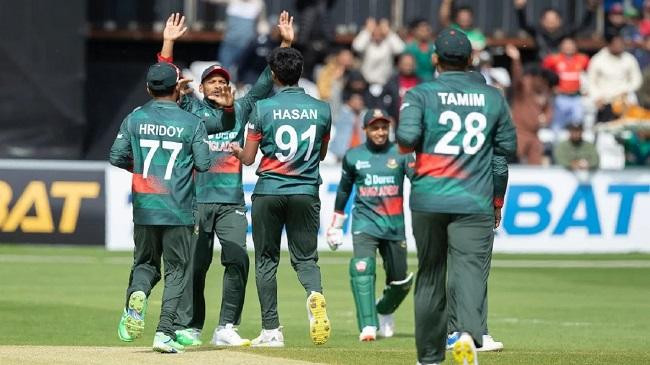 hasan mahmud celebrates with team mates the dismissal of andy balbirnie