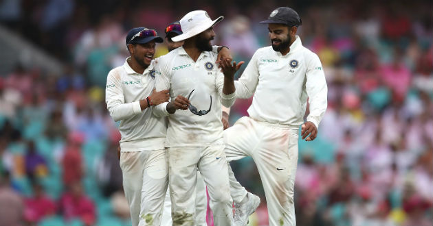 india celebrate a wicket over australia